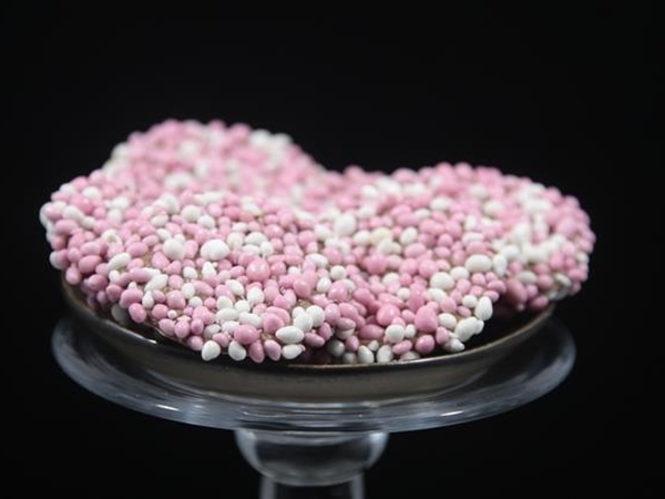 Geboorte flikken roze wit